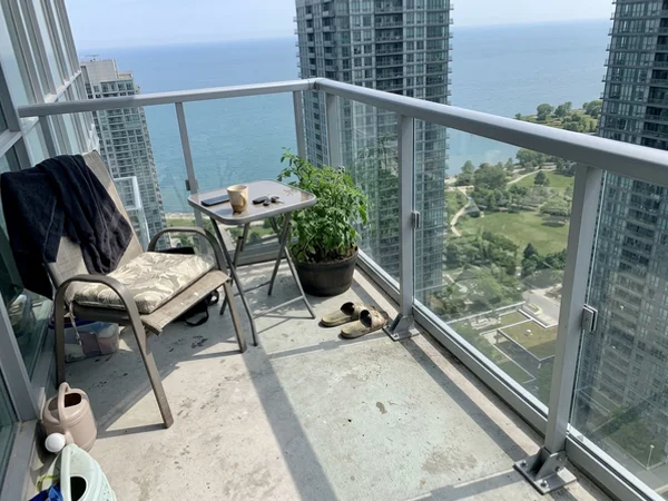 New tempered balcony guard panel on a Mimico condo